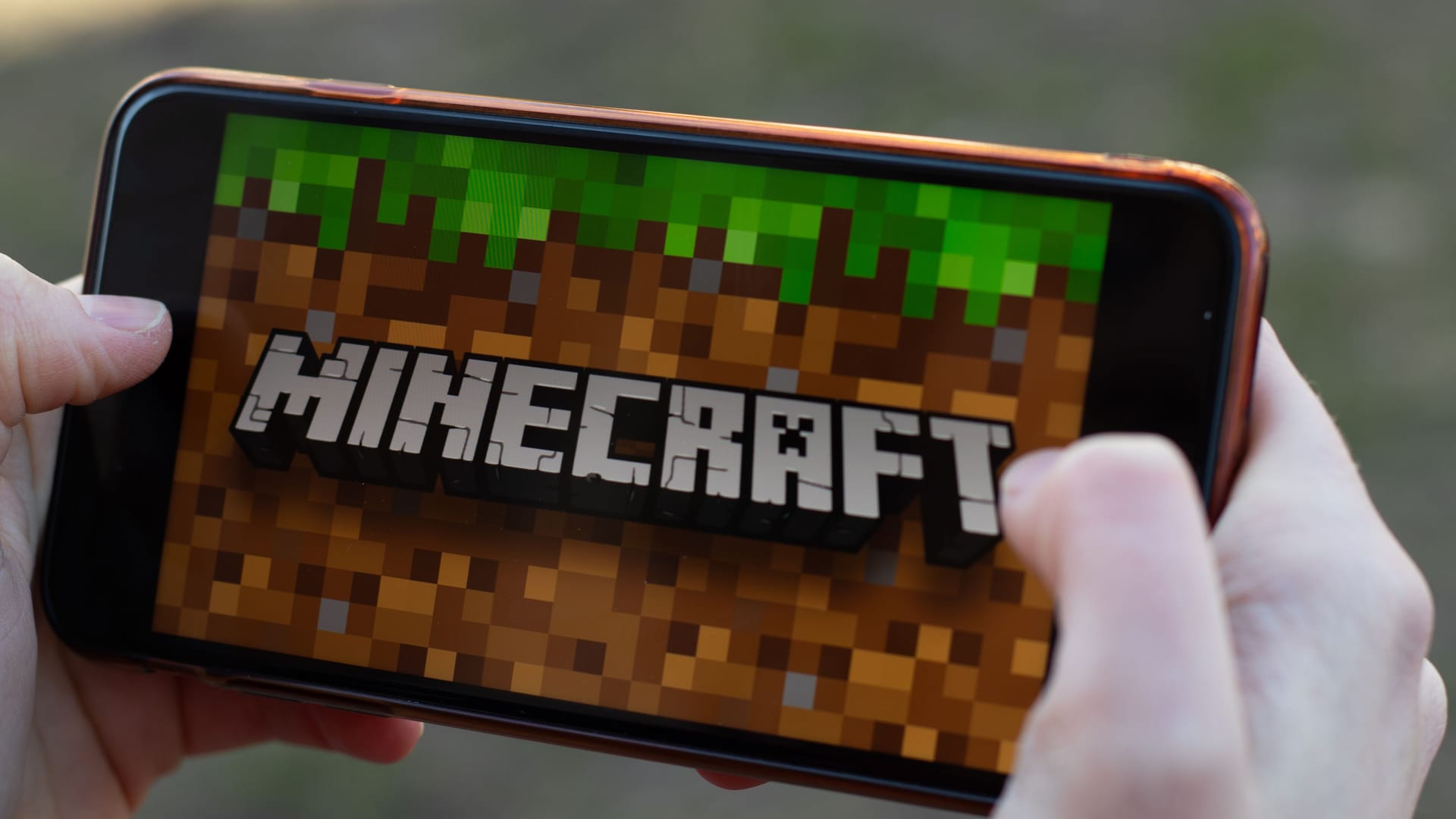 New York, USA - 1 May 2020: Minecraft game app logo close-up on phone screen, Illustrative Editorial