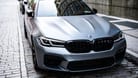 New York City, USA - July 15, 2023: BMW F90 M5 grey color car parked, corner view