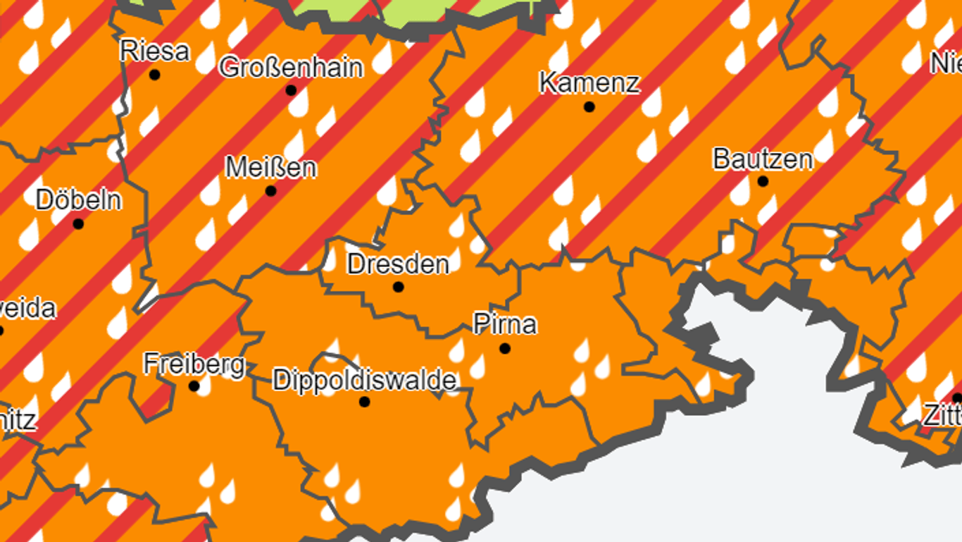 Karte mit Warnungen des Deutschen Wetterdiensts: In den rot gestrichelten Regionen, können zusätzlich zum Dauerregen kräftige Gewitter mit Unwetterpotenzial aufziehen.