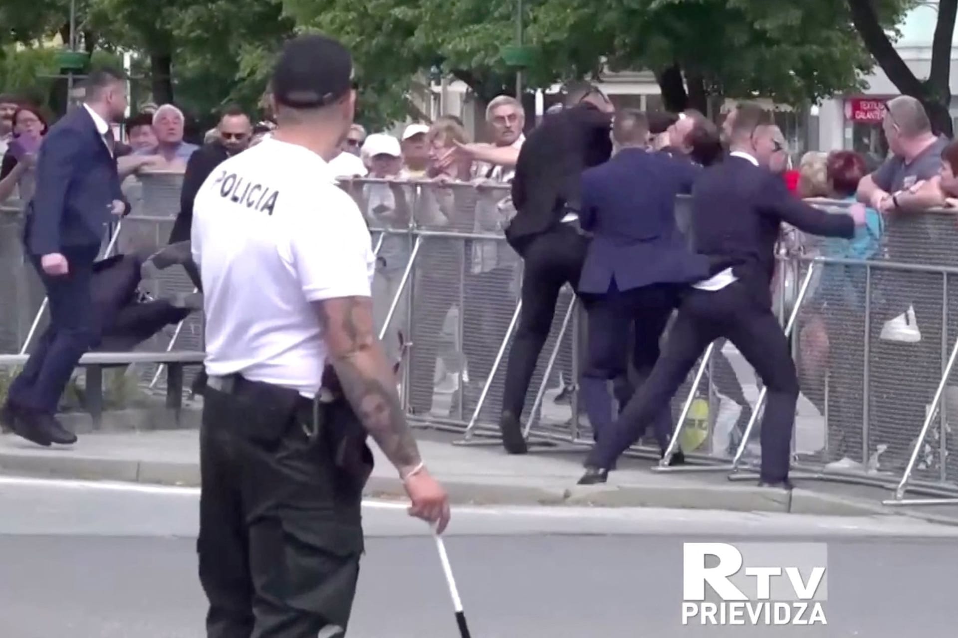 Members of Slovakia's Prime Minister Robert Fico's security detain a man during a shooting incident in this screen grab from a video