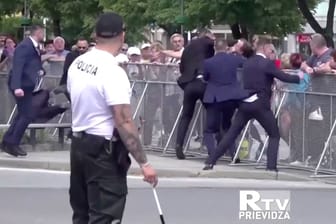 Members of Slovakia's Prime Minister Robert Fico's security detain a man during a shooting incident in this screen grab from a video