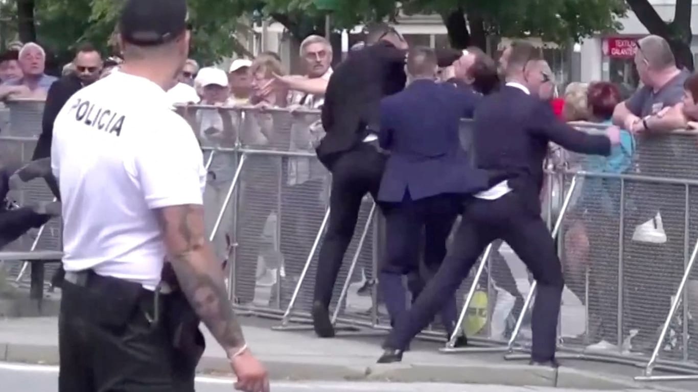 Members of Slovakia's Prime Minister Robert Fico's security detain a man during a shooting incident in this screen grab from a video
