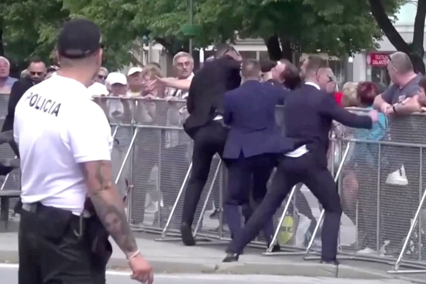 Members of Slovakia's Prime Minister Robert Fico's security detain a man during a shooting incident in this screen grab from a video