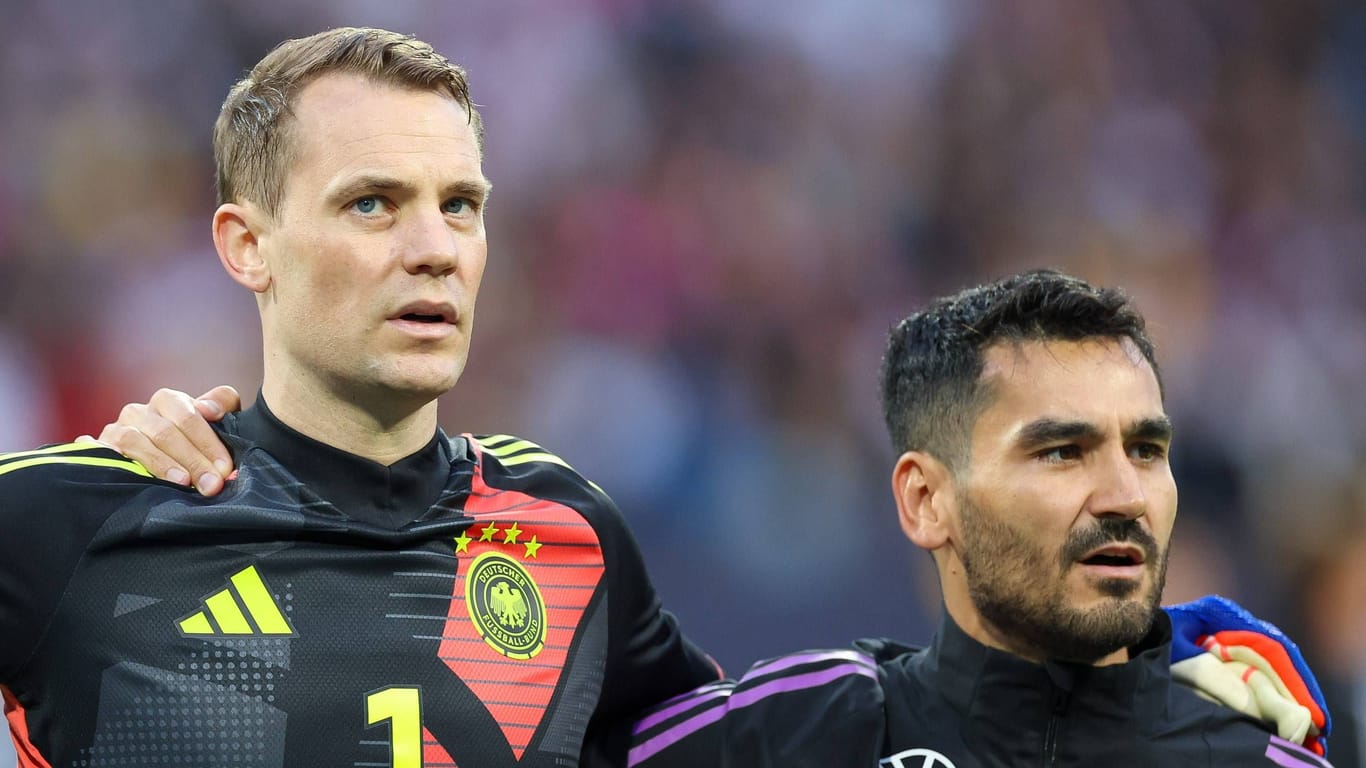 Manuel Neuer (l.) und Ilkay Gündogan (r.): Einige t-online-Leser halten die Fußballer des EM-Kaders für unwürdig.