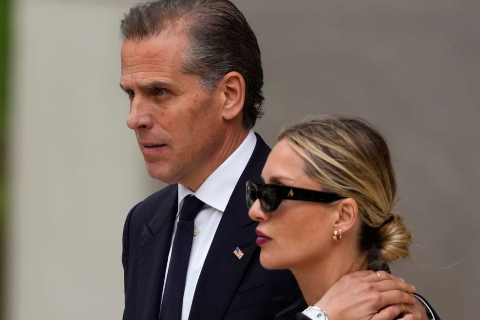 Hunter Biden (l.) und seine Frau Melissa verlassen das Gericht in Delaware.