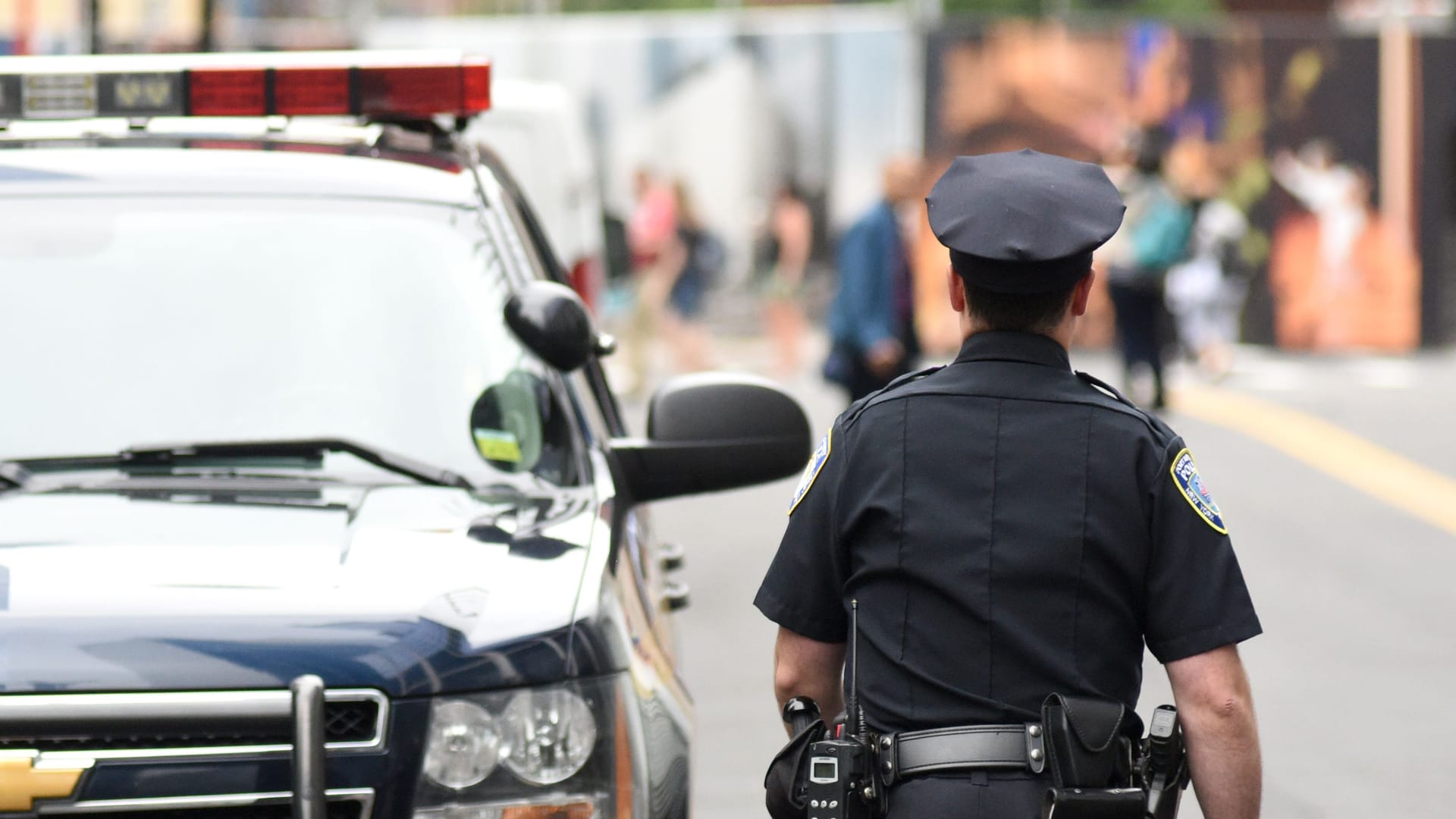 NEW YORK, USA - June 10, 2018: Police officer performing his duties on the streets of Manhattan. New York City Police Department (NYPD).