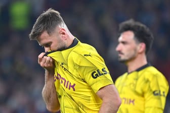Niclas Füllkrug (l.) und Mats Hummels: Die Dortmunder erlebten einen bitteren Abend.