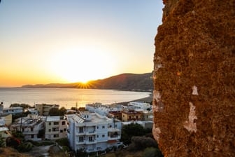 scenic view of sunset and beach of paleochora old town, crete