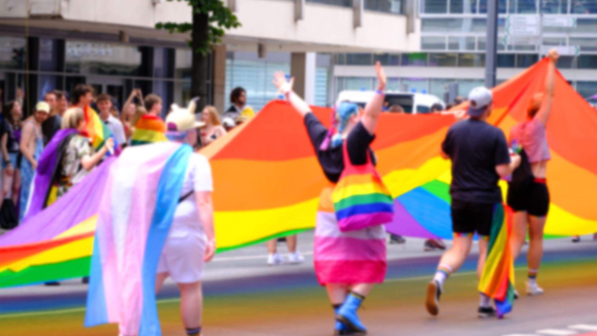 march LGBTQ community, mass march of lesbian, gay people, bisexual, transgender with rainbow flags, Gay pride parade in city with rainbow flags, against discrimination on queer people