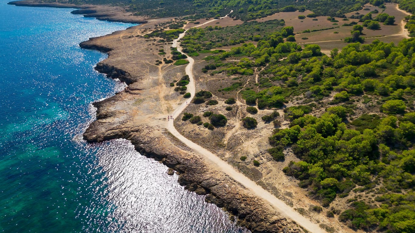 Cala Millor Mallorca shoreline with trail aerial viewduring sunny day