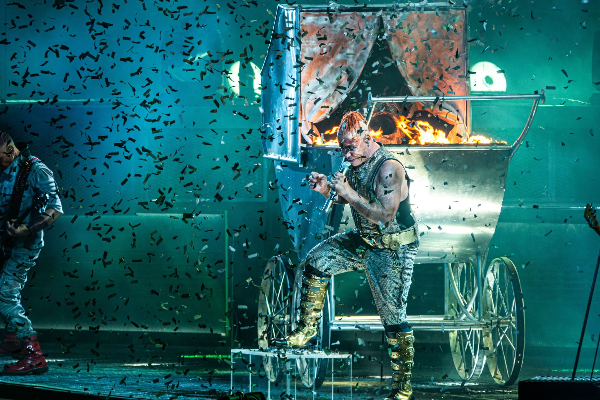 MOSCOW, RUSSIA - JULY 29, 2019: Rammstein group fire concert at Luzhniki Stadium. Crowds of fans gathered at a rock concert of their favorite metal band.