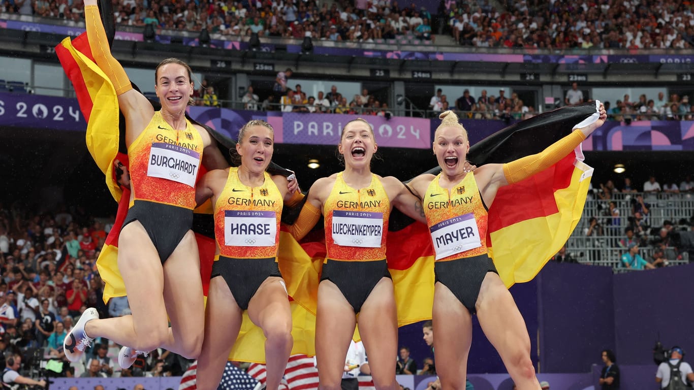 Die deutsche 4x100m-Staffel nach dem Gewinn der Bronze-Medaille in Paris: Jubeln deutsche Athleten auch bald in der Heimat?