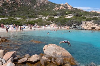 Tourists on the island of SPARGI in Sardinia