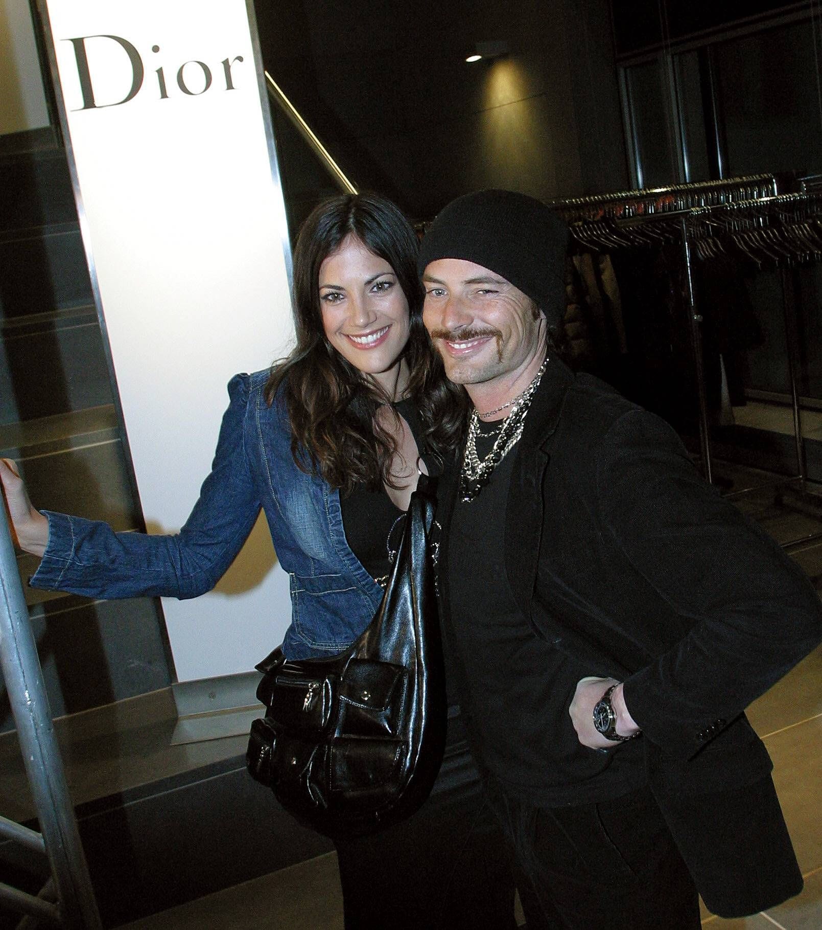 Bettina Zimmermann und Comedian Erkan bei einer Dior-Modenschau in München im Jahr 2004.