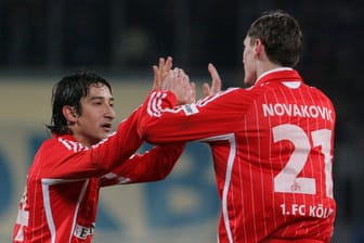 Serhat Akin (l.) beim Jubel mit Milivoje Novakovic vom 1. FC Köln: Der Ex-Mittelfeldspieler der Kölner wurde in der Türkei angeschossen und schwer am Fuß verletzt.