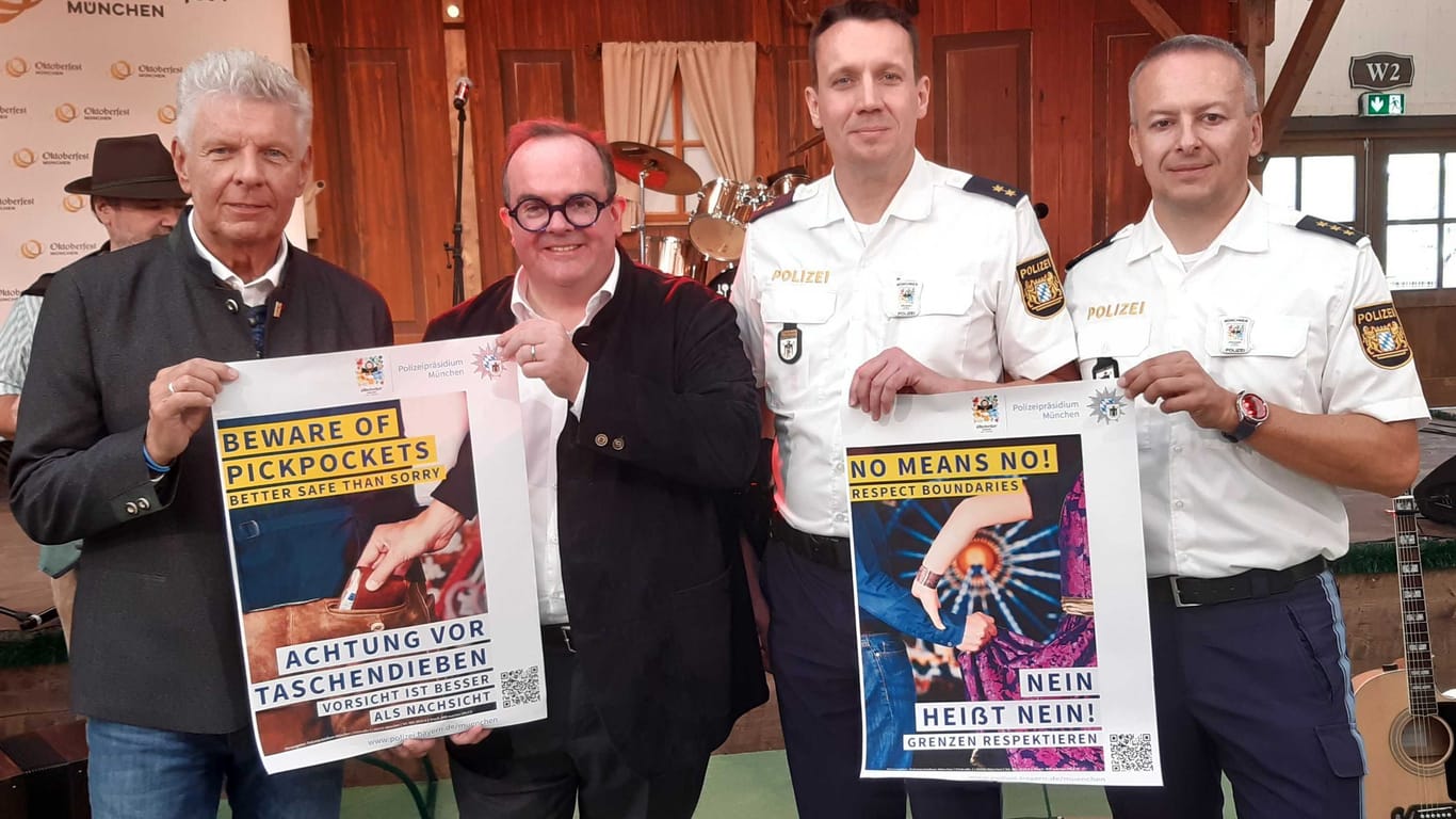 Oberbürgermeister Dieter Reiter, Wiesn-Chef Clemens Baumgärtner, Polizeisprecher Andreas Frank und Wiesn-Wachleiter Christian Schäfer: Diese Plakate sollen überall auf dem Festgelände hängen.