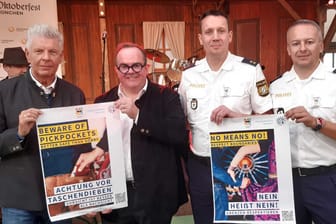 Oberbürgermeister Dieter Reiter, Wiesn-Chef Clemens Baumgärtner, Polizeisprecher Andreas Frank und Wiesn-Wachleiter Christian Schäfer: Diese Plakate sollen überall auf dem Festgelände hängen.