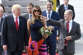 Donald und Melania Trump mit dem damaligen Bürgermeister Olaf Scholz (r.) beim G20-Gipfel 2017 in Hamburg.