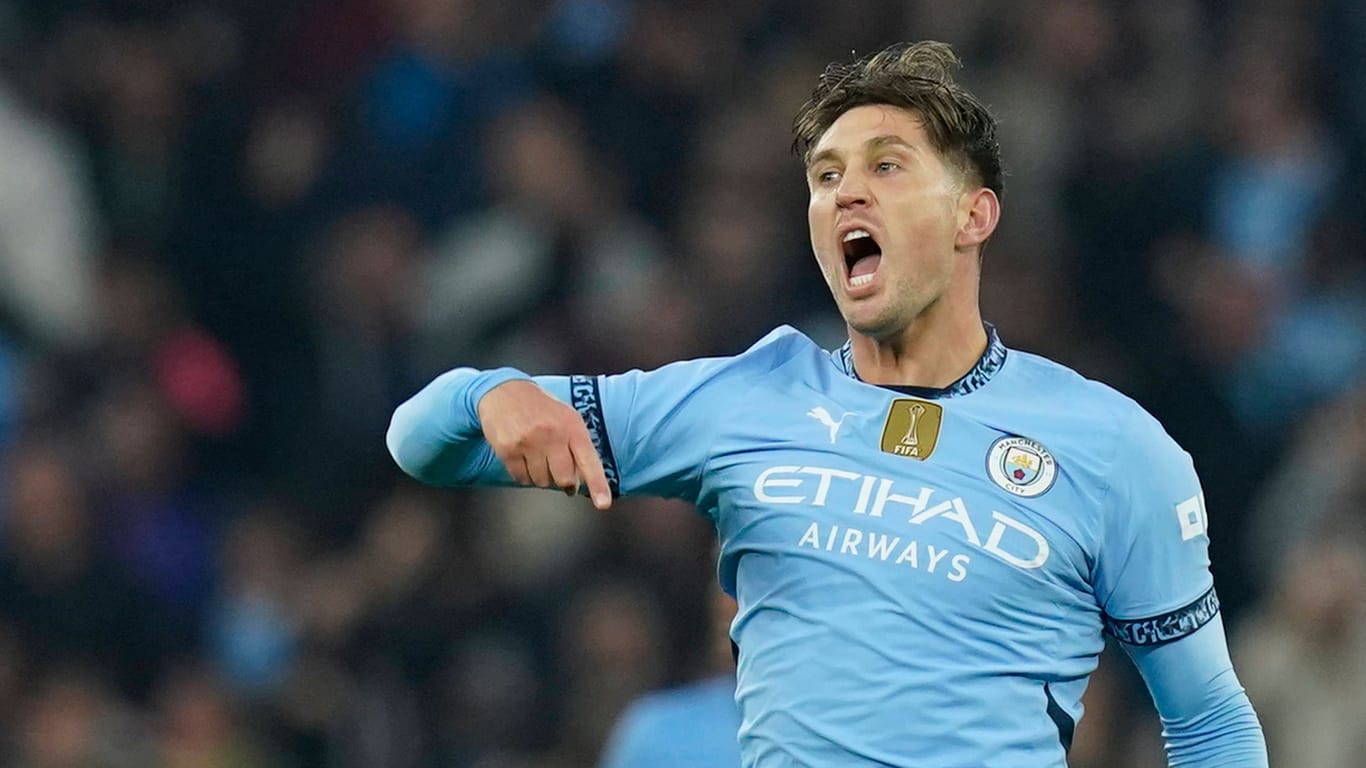 John Stones jubelt: Er schaffte den späten Ausgleich für Manchester City.