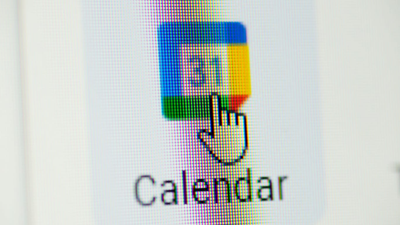 Macro shot of cursor of mouse on Google Calendar icon. Chernihiv, Ukraine - January 15, 2022