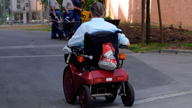 Elderly man drives mobility scooter on German autobahn