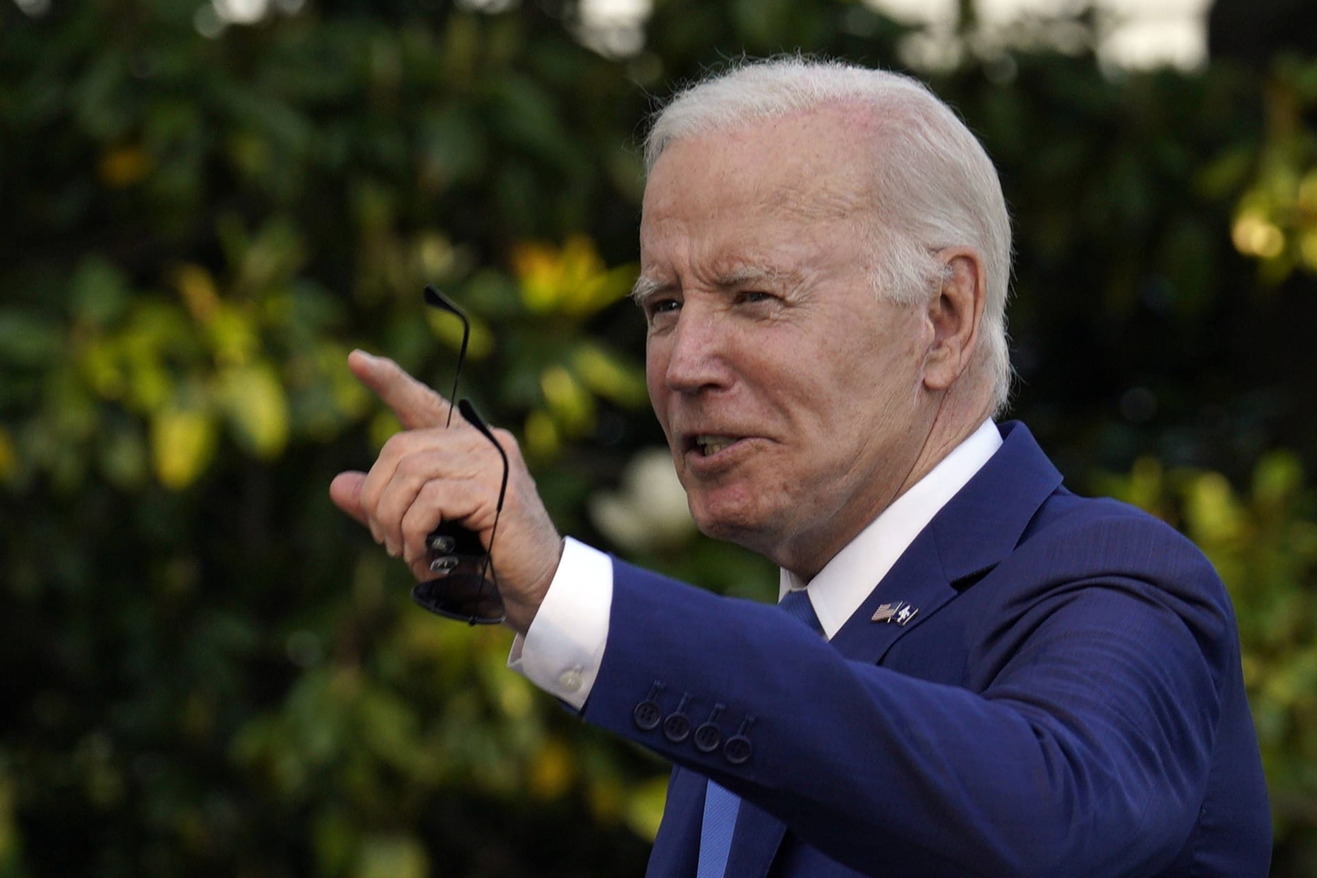 President Joe Biden walks on the South Lawn of the White House upon his return from Colorado.