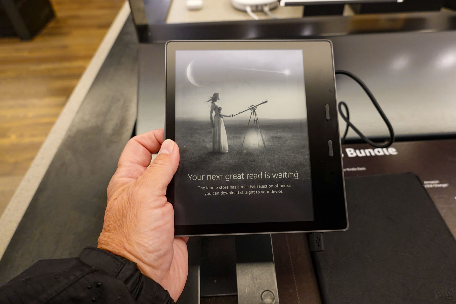 An Amazon Kindle Paperwhite device on sale at an Amazon Book Store.