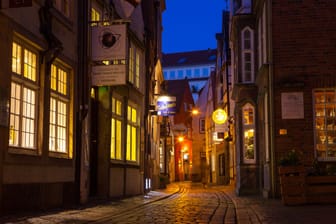 BREMEN, GERMANY - 17 APR 2016: Historic streets of illuminated Schnoor quarter at night