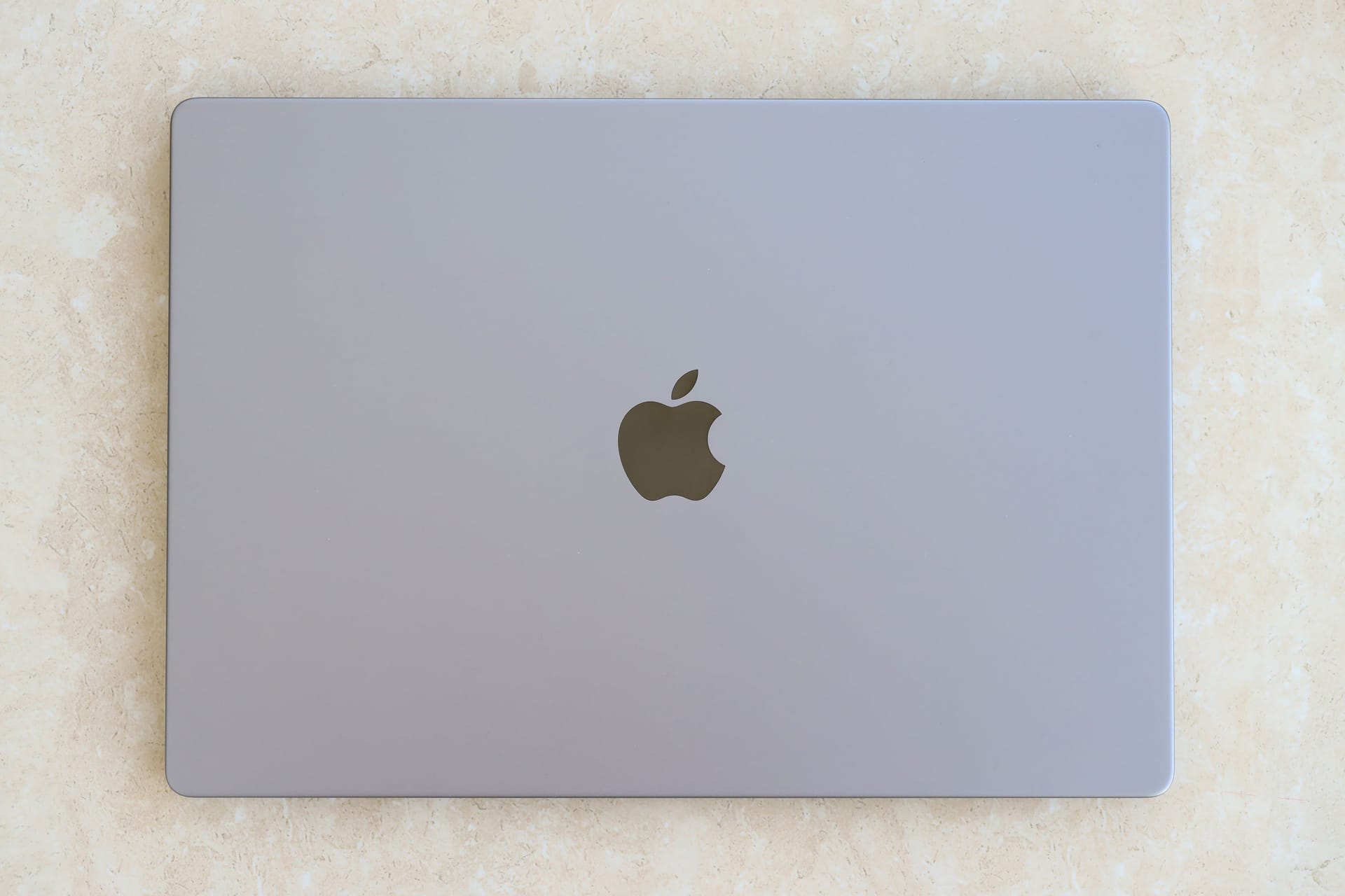 KYIV, UKRAINE - 4 MAY, 2023: Cover view of MacBook Air MacBook Pro 13 in space gray color isolated on white background