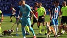 Spieler von Espanyol Barcelona mit den Hunden ohne Zuhause: Die Partie gegen Mallorca war aus doppelter Hinsicht ein Erfolg für die Spanier.