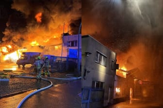 Flammen schlagen aus einer Halle: 30 Anwohner mussten von der Feuerwehr betreut werden.