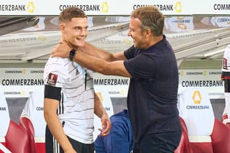 Florian Wirtz (li.) und der damalige Bundestrainer Hansi Flick 2021 bei der Nationalmannschaft: Blick für Talent.