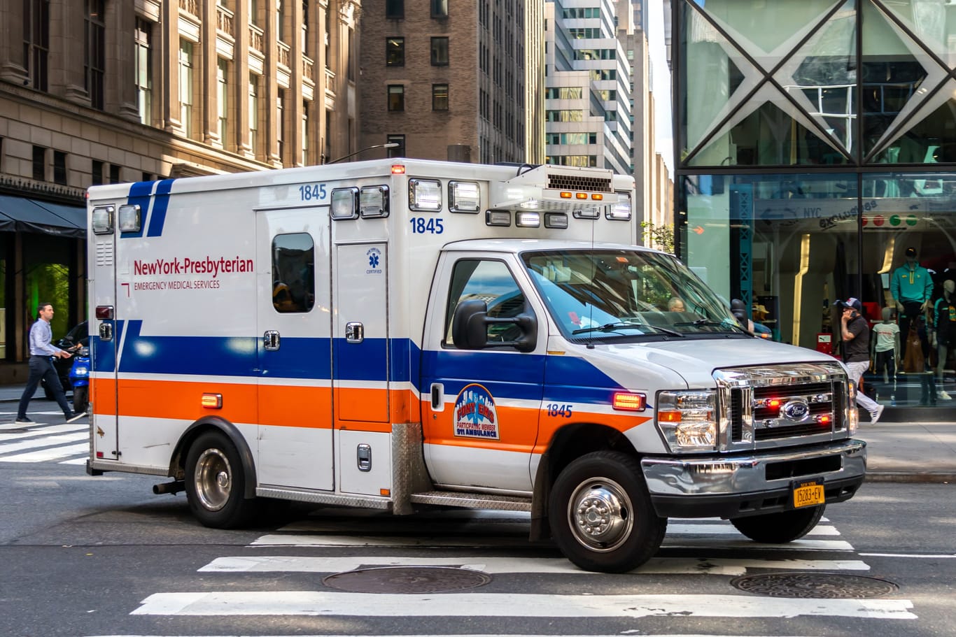 New York City, United States - September 18, 2022. An ambulance rides with a siren on a call on the streets of New York