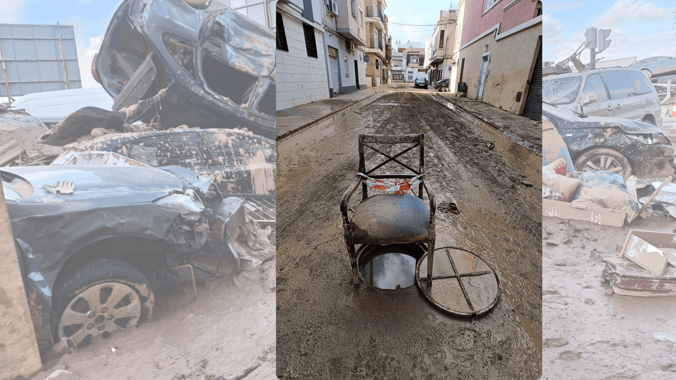 Design ohne Titel - 1Unwetter haben Fluten in Valencia ausgelöst: Ein fungiert als provisorische Absperrung.