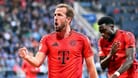 Harry Kane und Alphonso Davies (r.): Ob die Bayern wichtige Punkte sichern können?