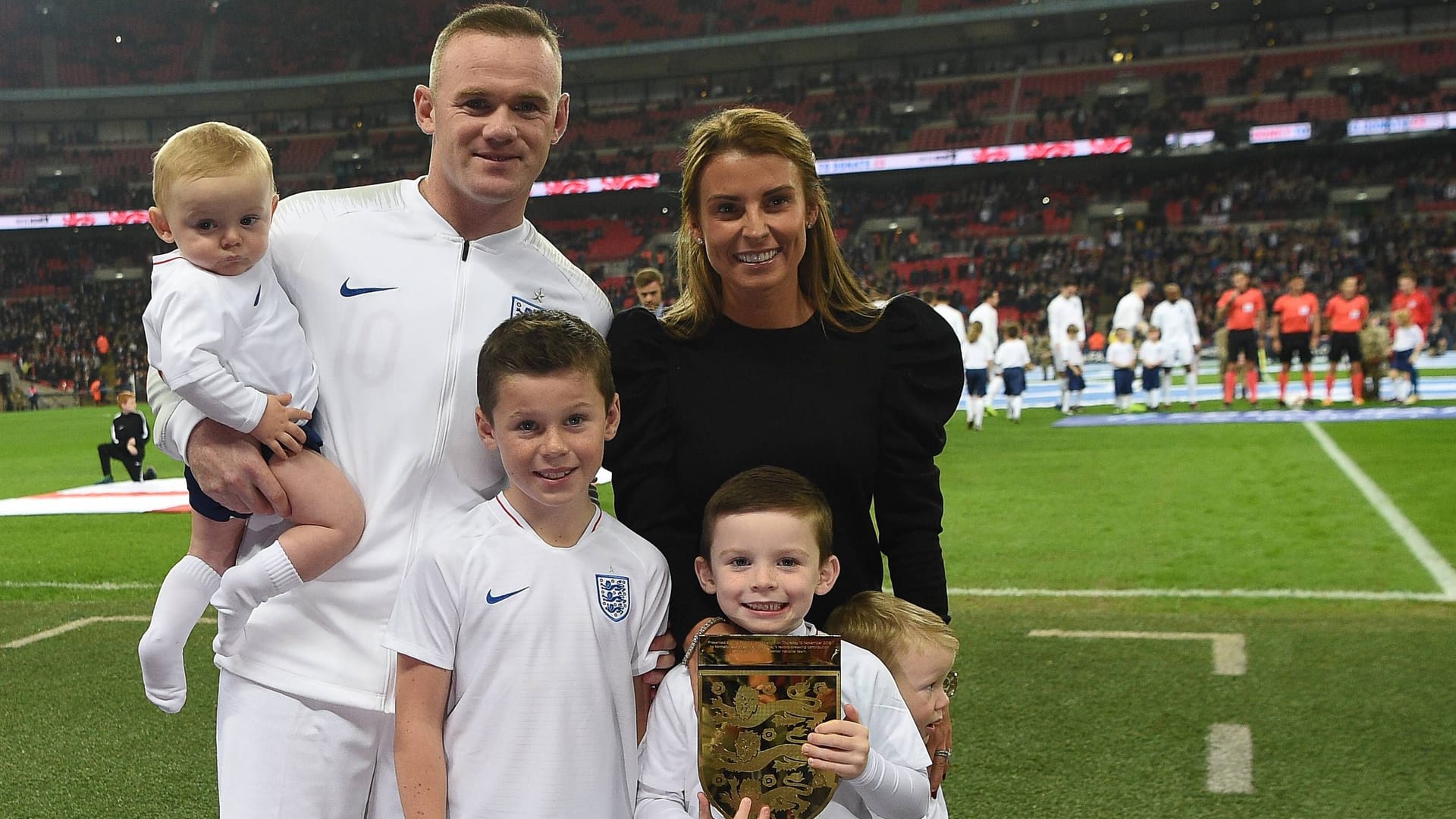 Familienfoto: Wayne Rooney, seine Frau Coleen und die gemeinsamen Kinder.