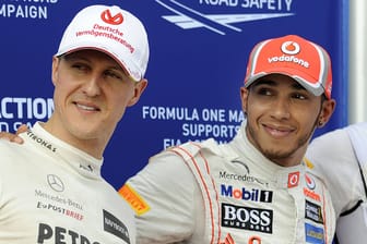 Michael Schumacher (links) und Lewis Hamilton: Die beiden teilen sich den WM-Rekord der Formel 1.