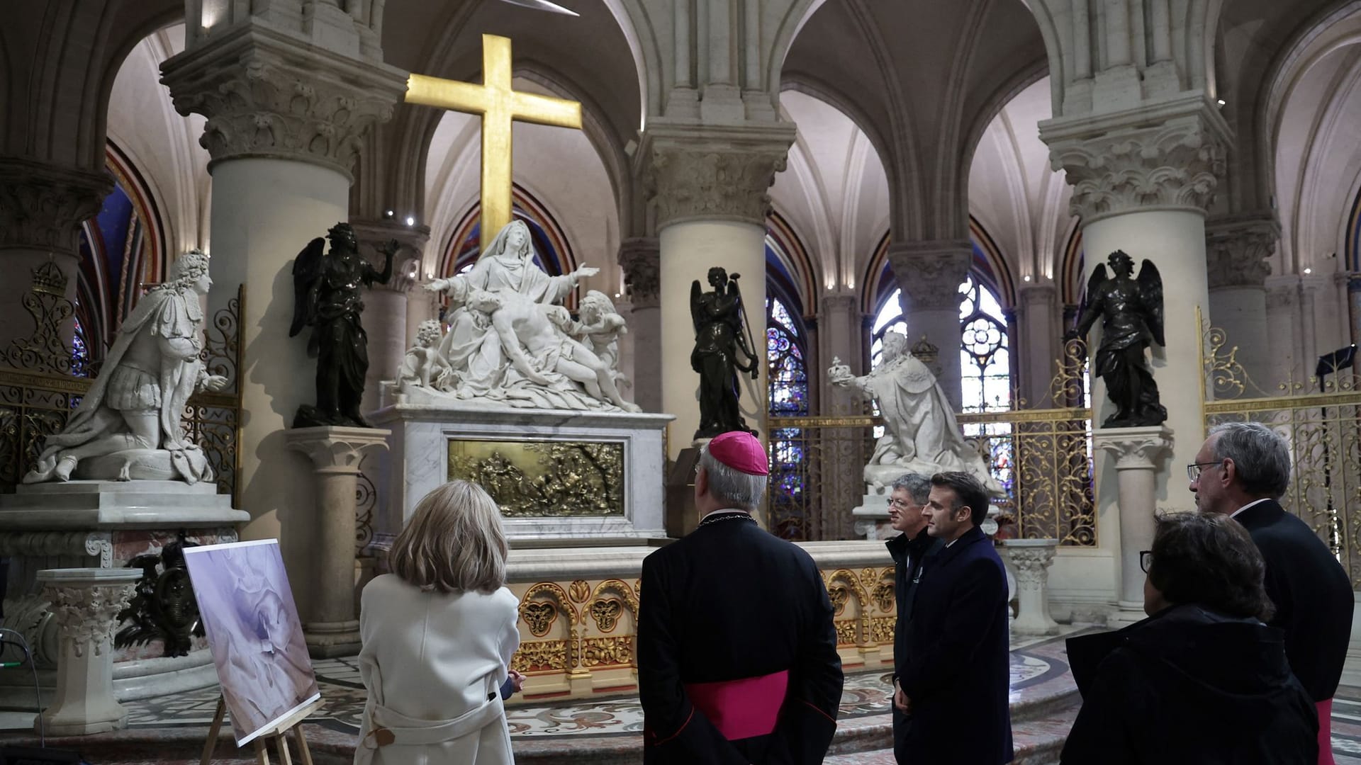 French President Macron visits the Notre-Dame Cathedral, in Paris