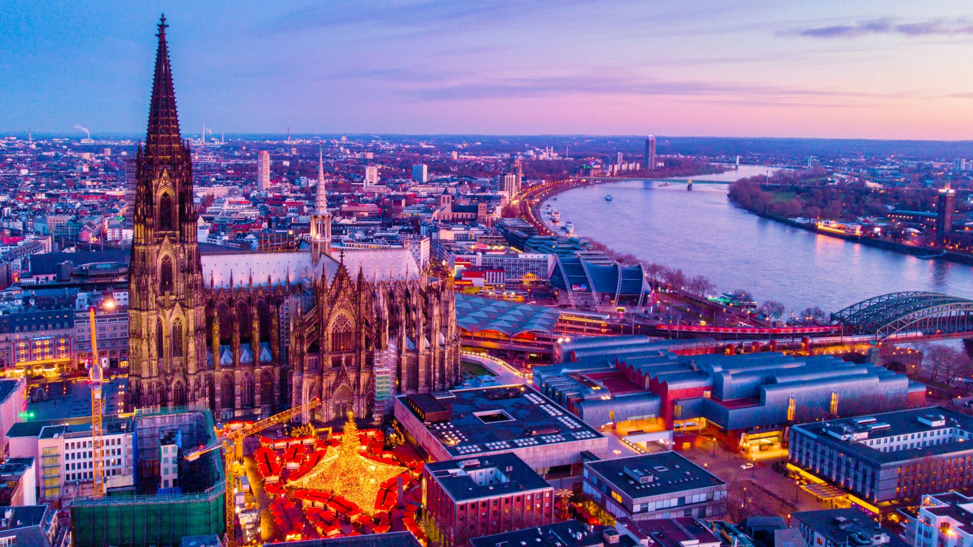 Cologne Germany Christmas market, aerial drone view over Cologne rhine river Germany Cathedral