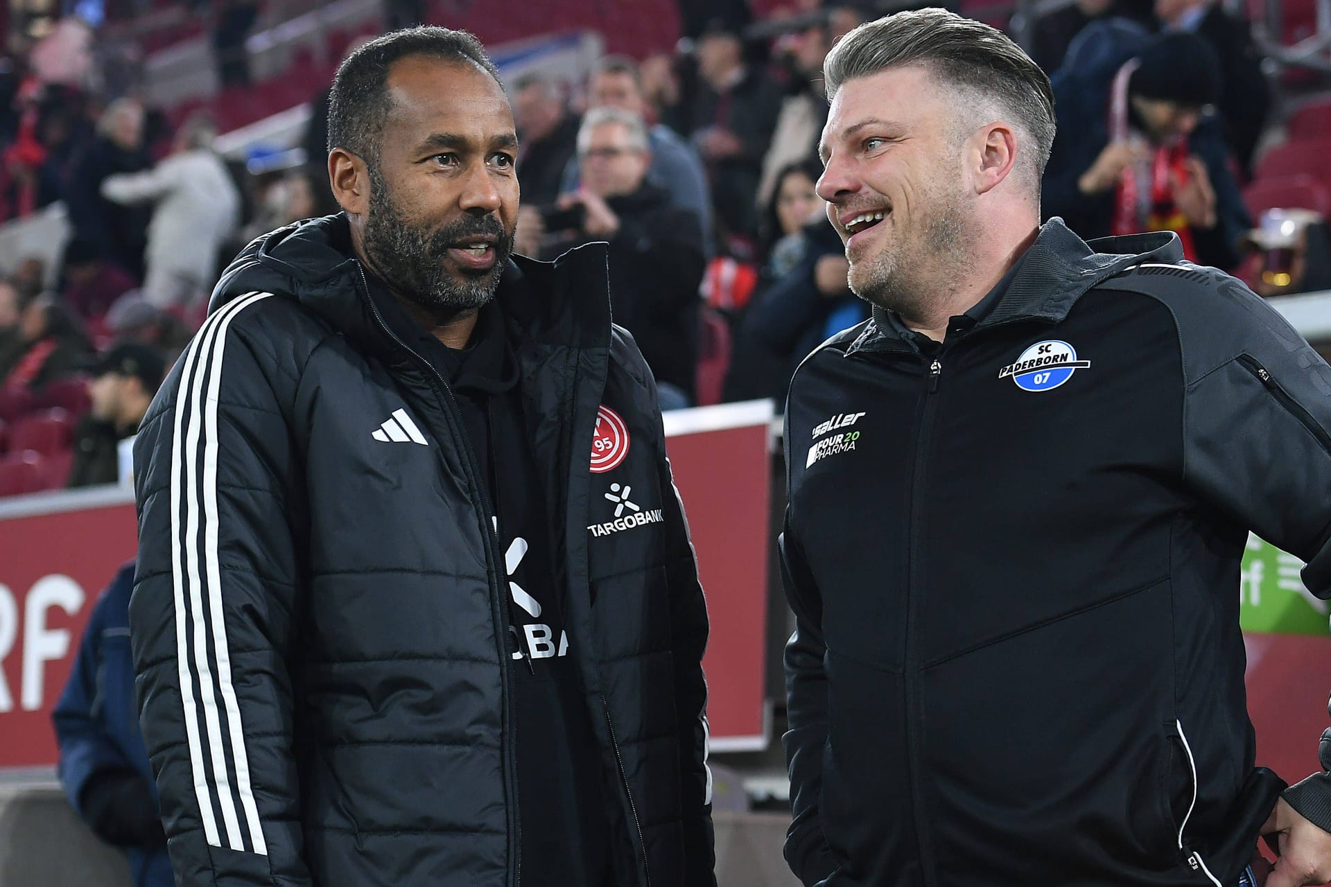 Lukas Kwasniok (r.) steht neben Düsseldorfs Daniel Thioune: Der Paderborn-Trainer wurde kürzlich heiß vom HSV umworben.