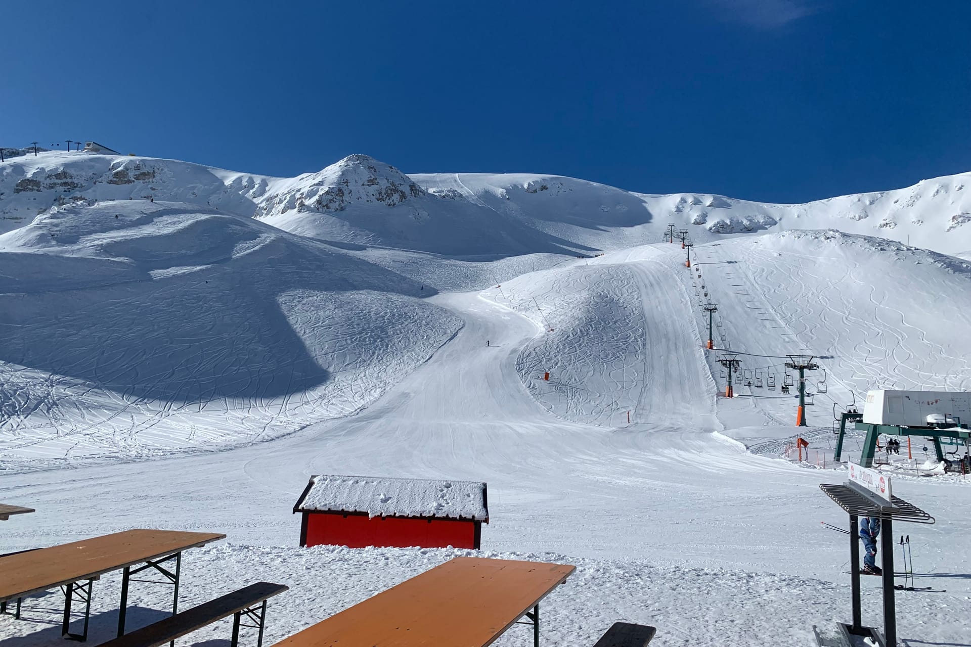 Roccaraso, Italy - January 30, 2023: The ski slope and chairlift of Piano Aremogna