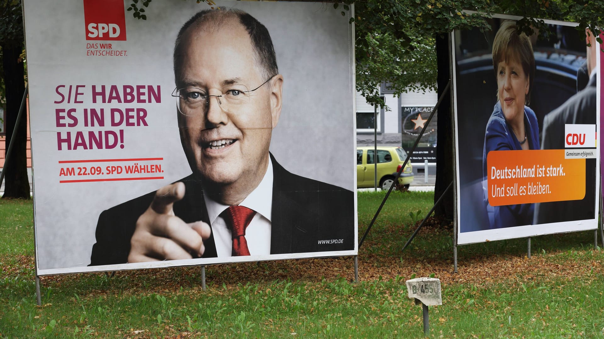 Wahlplakate von Peer Steinbrück und Angela Merkel zur Bundestagswahl 2013.