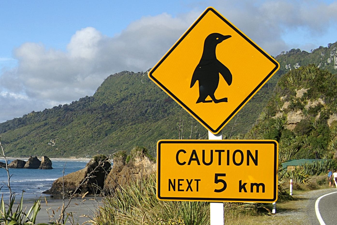 Penguins crossing sign