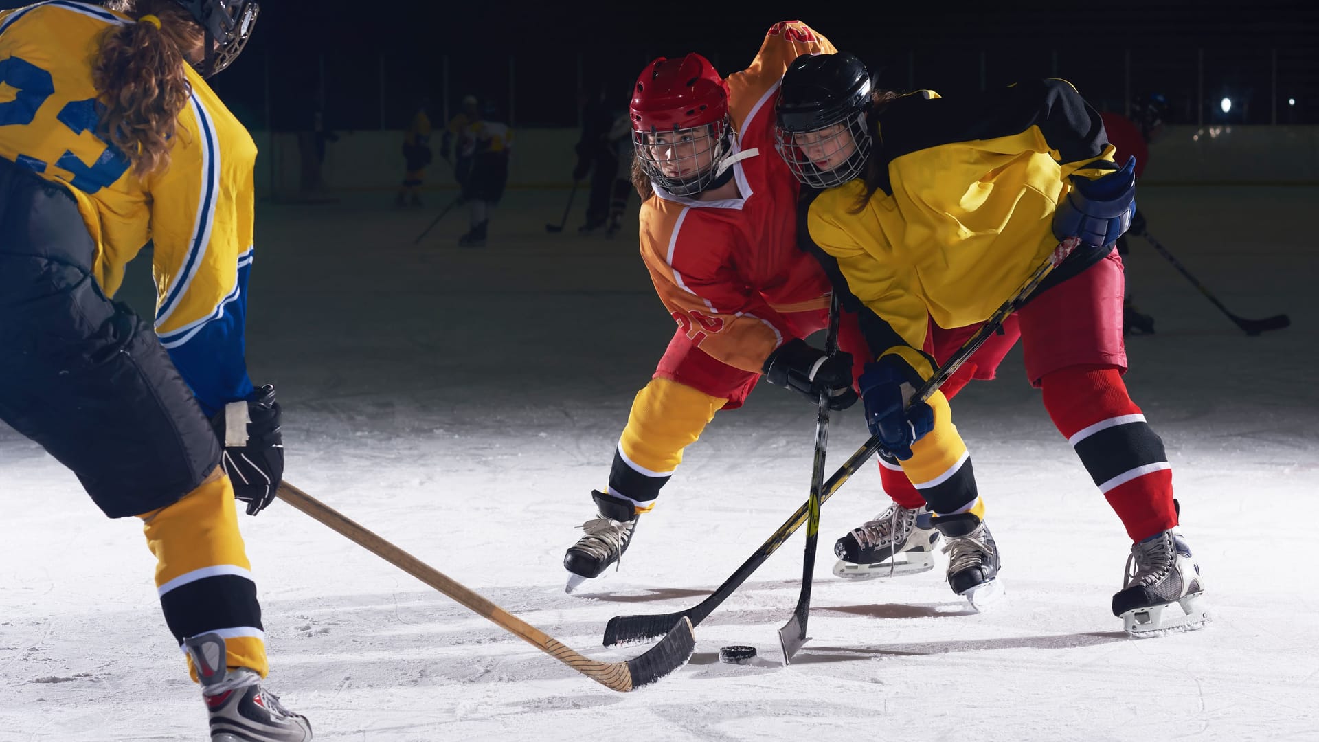 teen ice hockey sport players in action