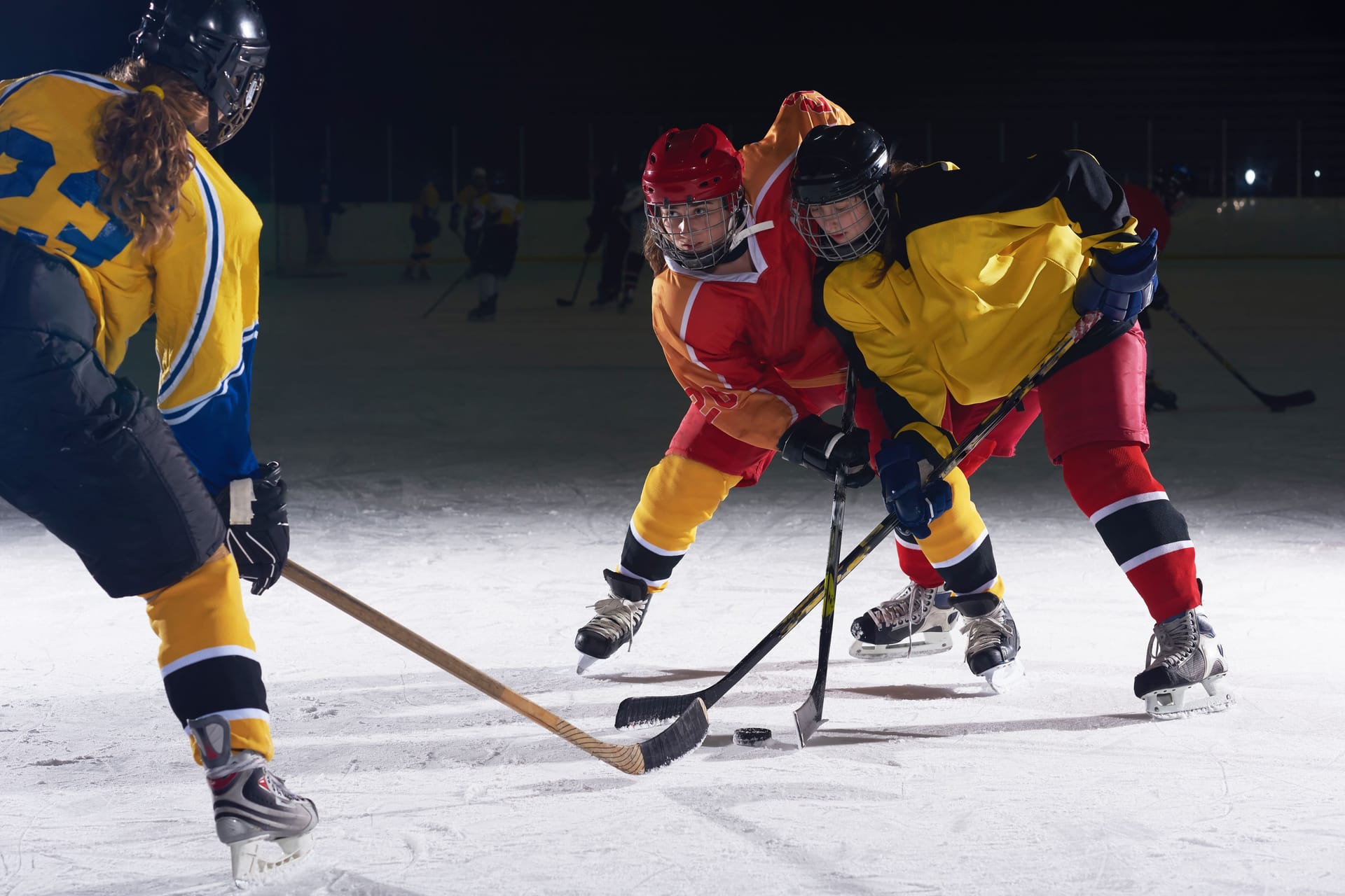 teen ice hockey sport players in action