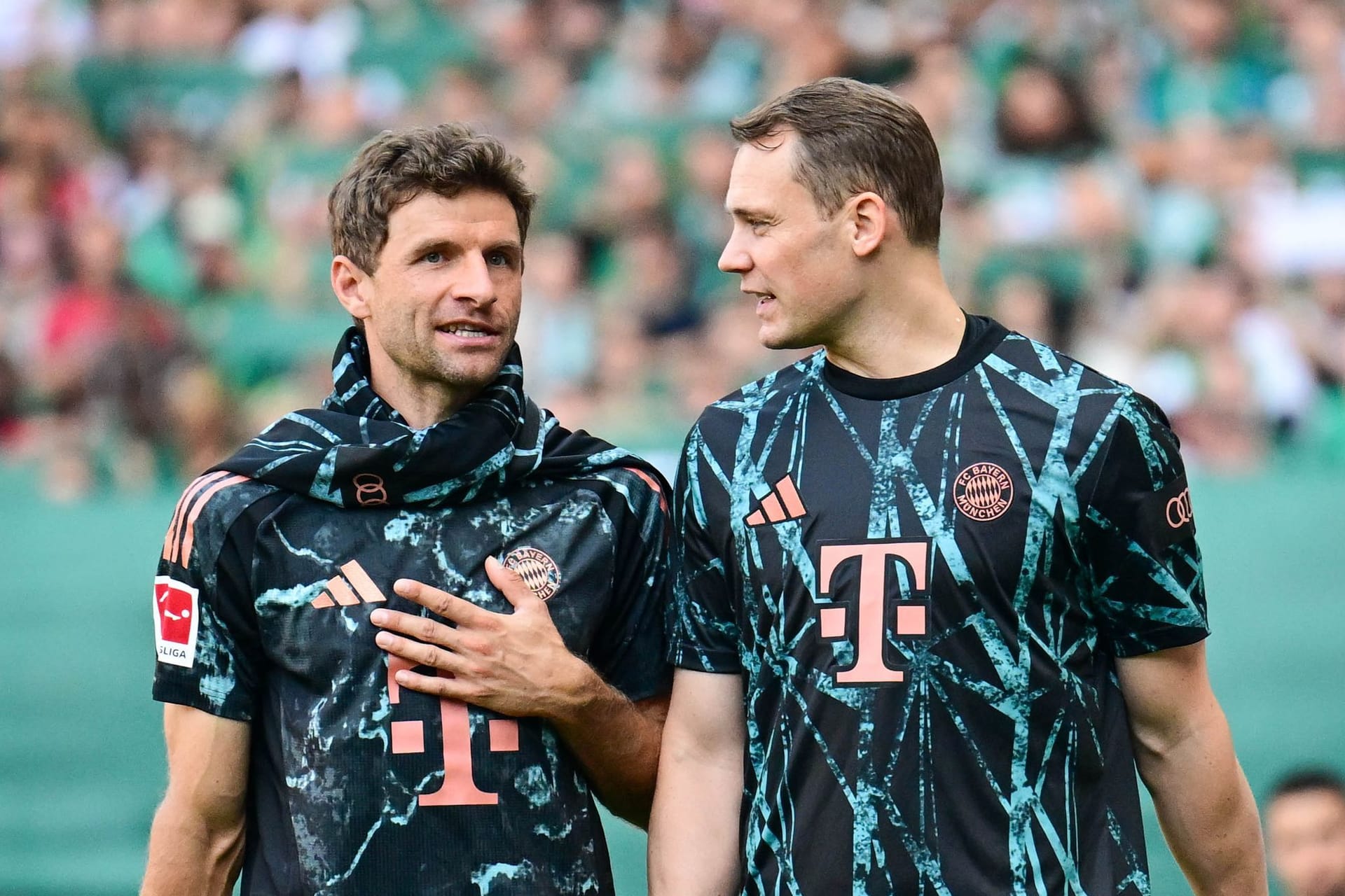 Thomas Müller (l) und Manuel Neuer