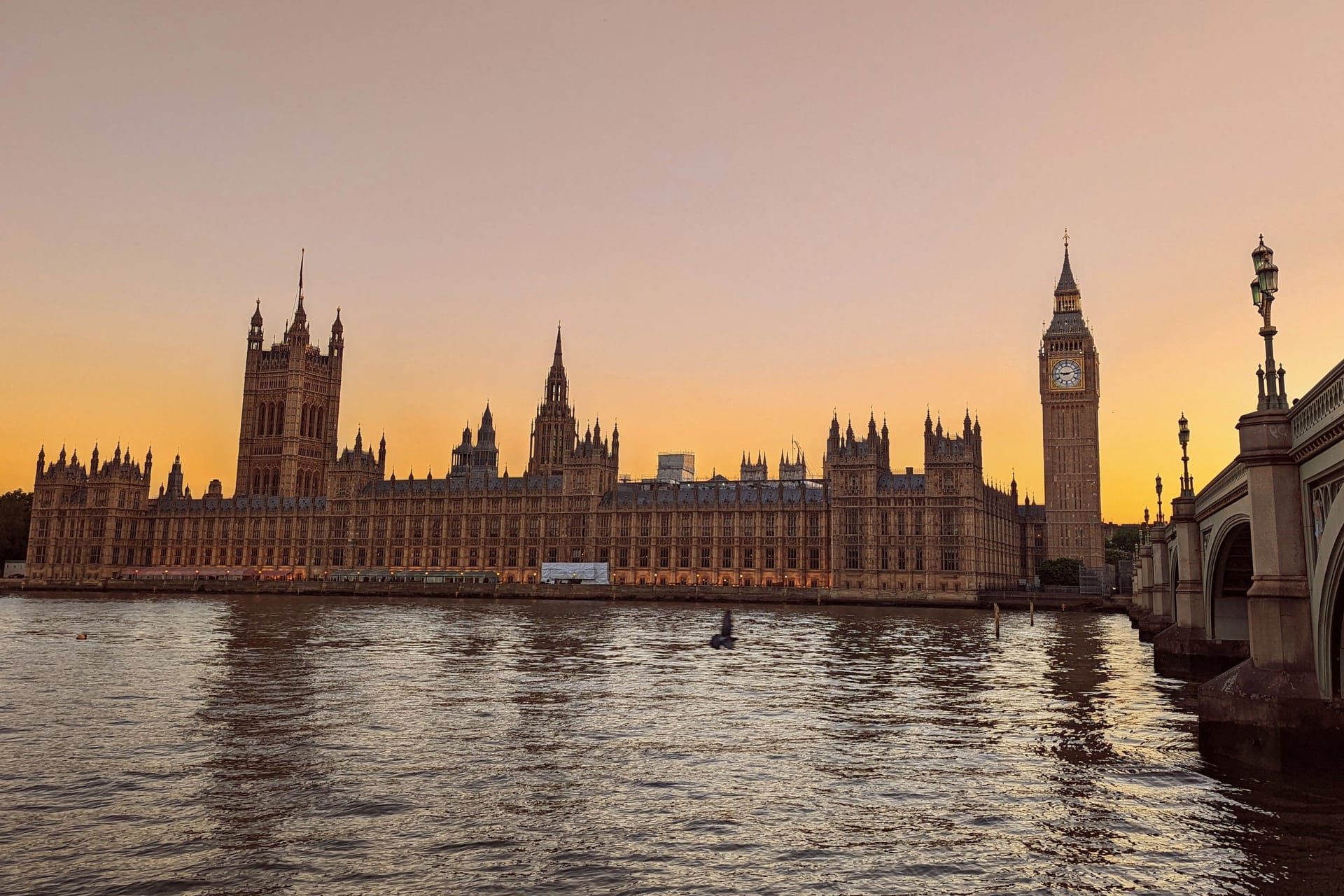 Scenic view of Big Ben and the Palace of Westminster on the banks of River Thames in London, UK