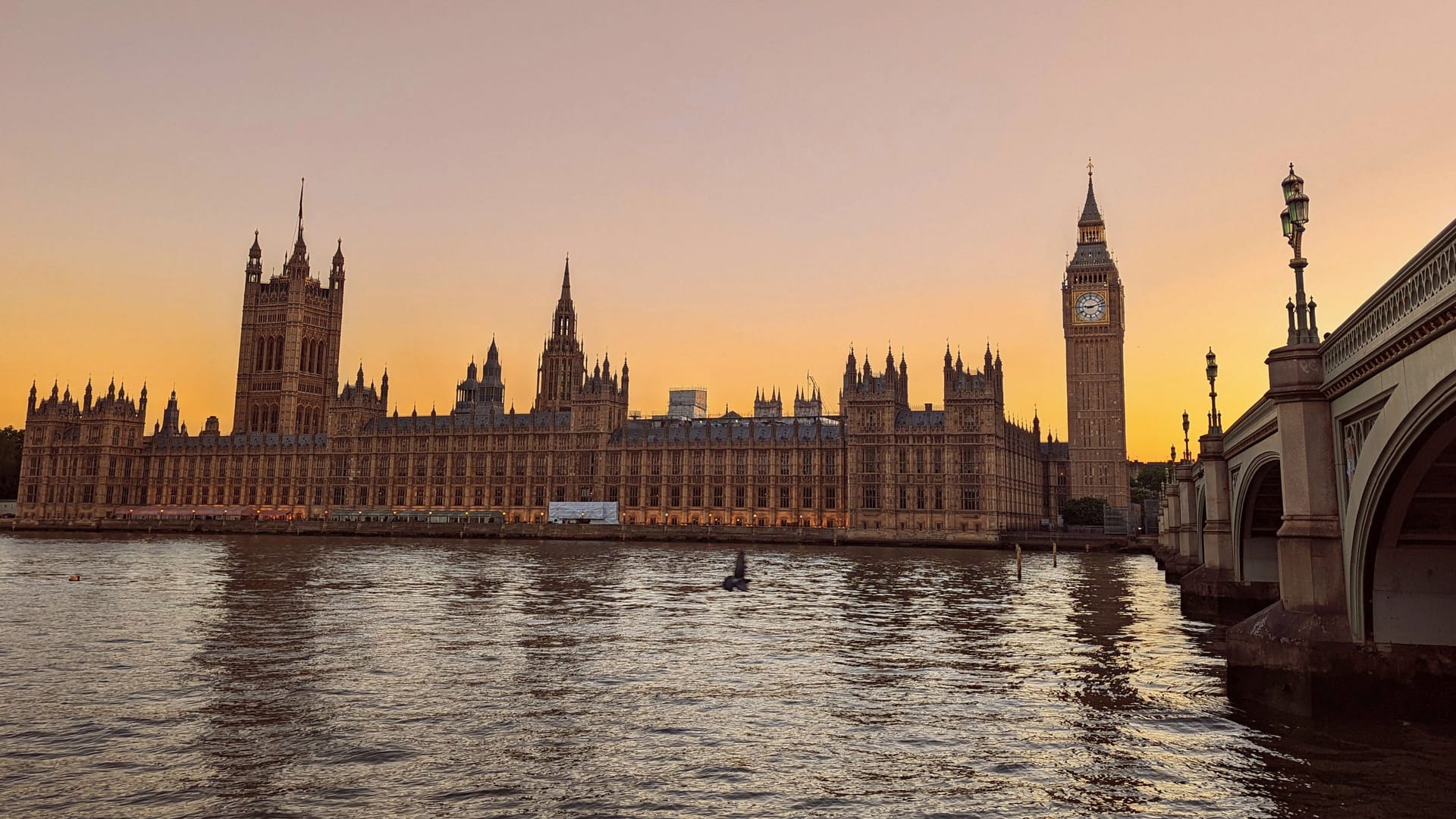 Scenic view of Big Ben and the Palace of Westminster on the banks of River Thames in London, UK