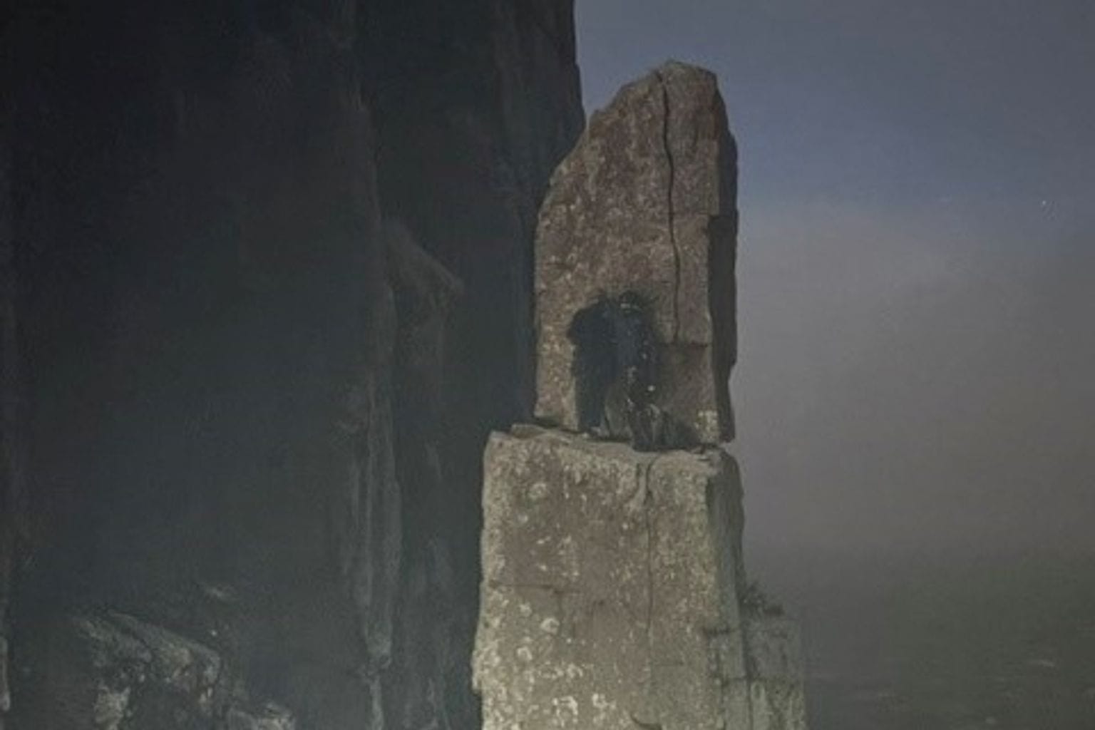 Kletterer auf dem Totem Pole in Tasmanien