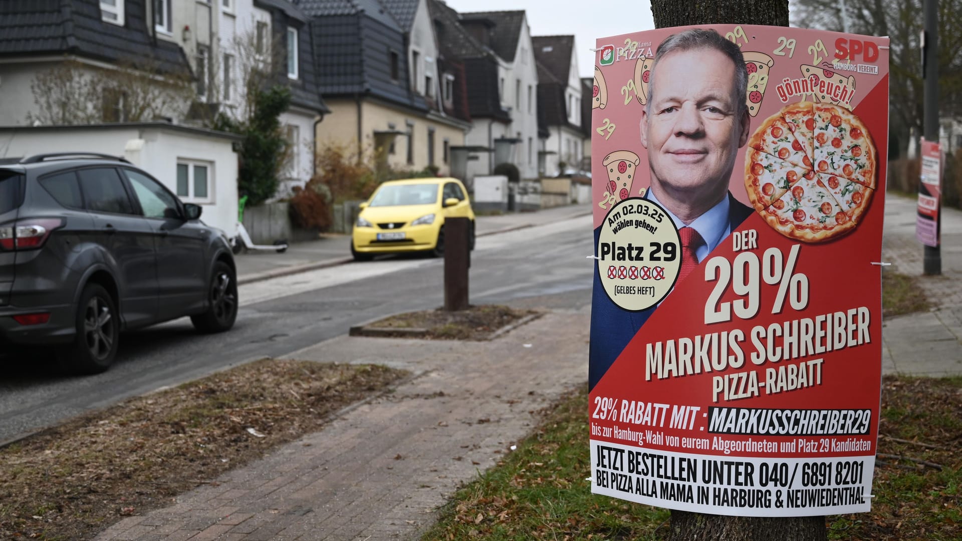 Wahlplakat des SPD-Bürgerschaftsabgeordneter Markus Schreiber in Hamburg: Er verspricht im Wahlkampf 29 Prozent Rabatt auf Pizza in Harburg und Neuwiedenthal.